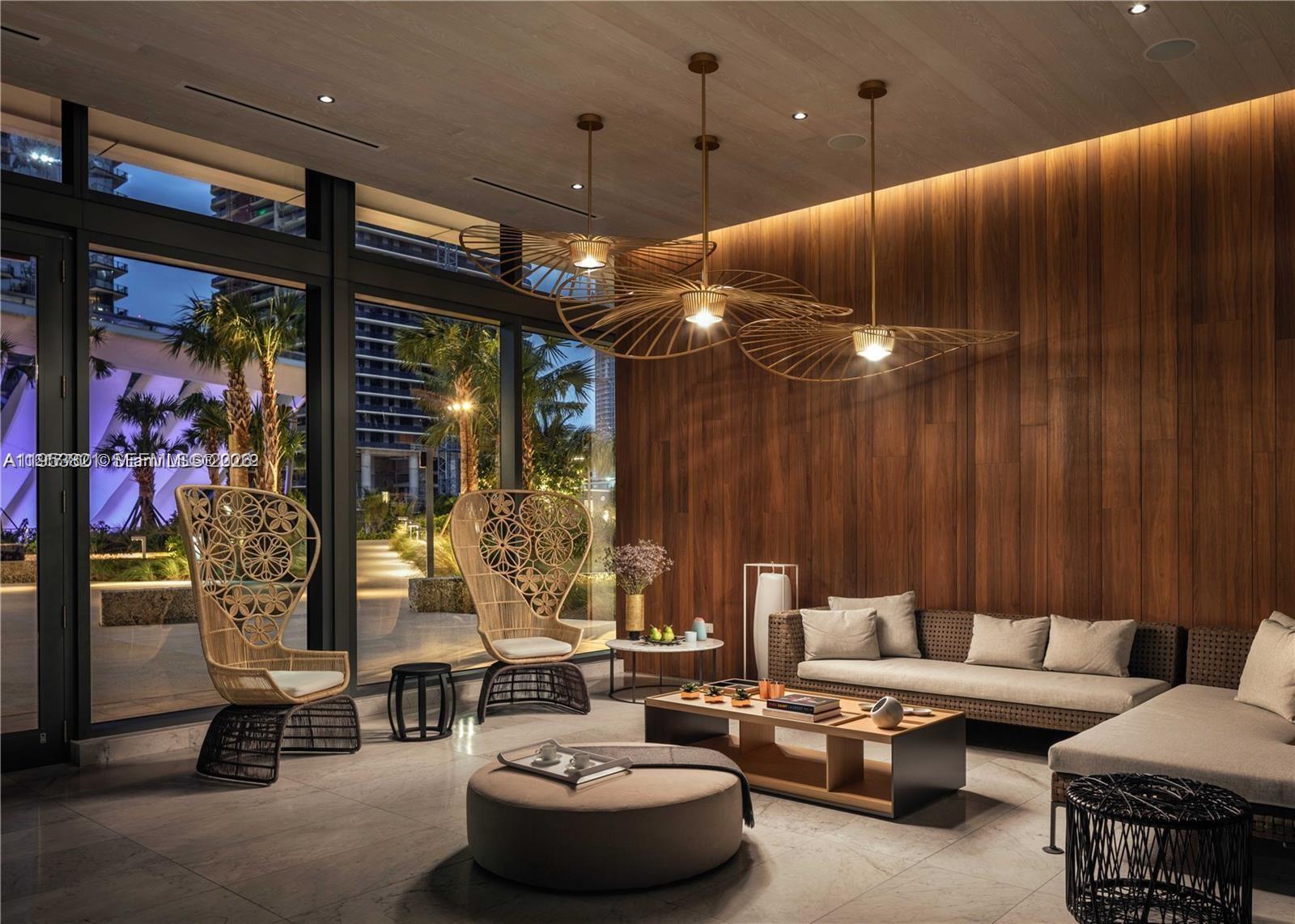 88 Southwest 7th Street, Unit 2506 Miami, FL 33130 - Photo 21 of 32 a living room with furniture and a large window