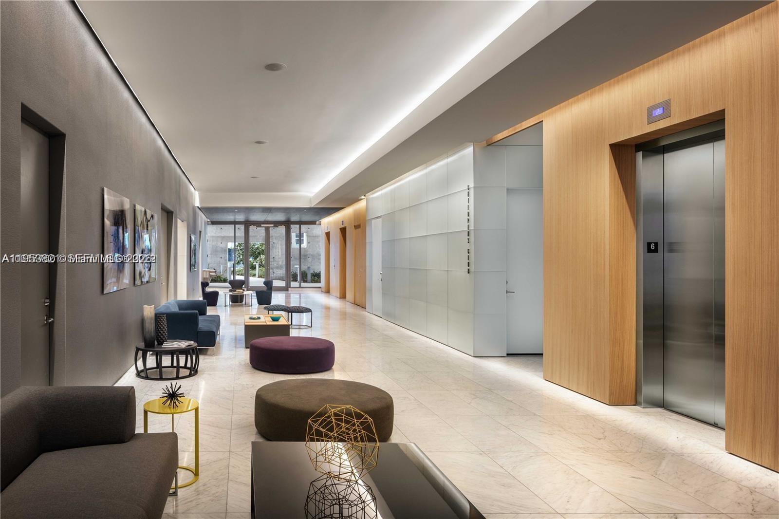 88 Southwest 7th Street, Unit 2506 Miami, FL 33130 - Photo 27 of 32 a living room with furniture and a large window