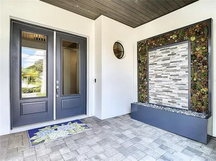 a kitchen with stainless steel appliances granite countertop a stove and a refrigerator