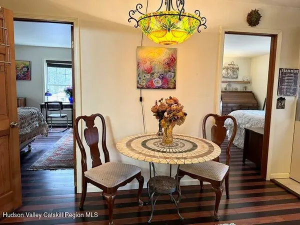 a living room with furniture rug and window
