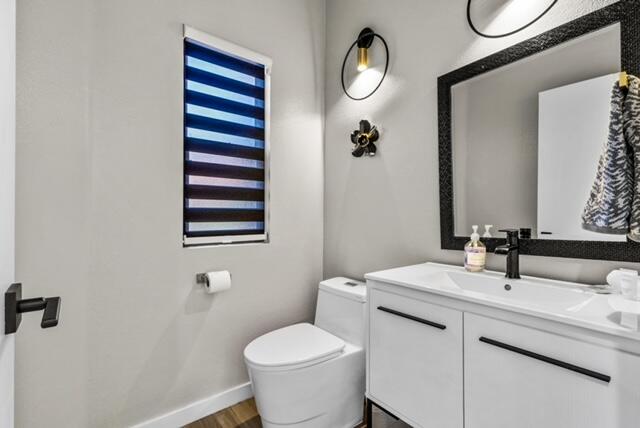 38101 Crocus Lane Palm Desert, CA 92211 - Photo 15 of 28 a bathroom with a sink mirror vanity and toilet