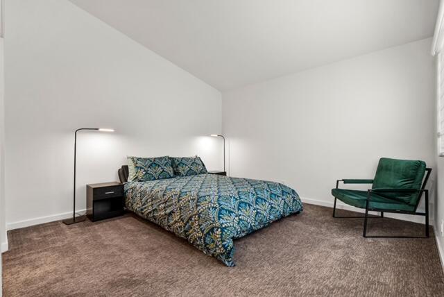 38101 Crocus Lane Palm Desert, CA 92211 - Photo 20 of 28 a bedroom with a bed and a chair