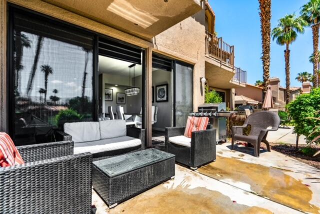 38101 Crocus Lane Palm Desert, CA 92211 - Photo 23 of 28 a view of living room kitchen and dining area