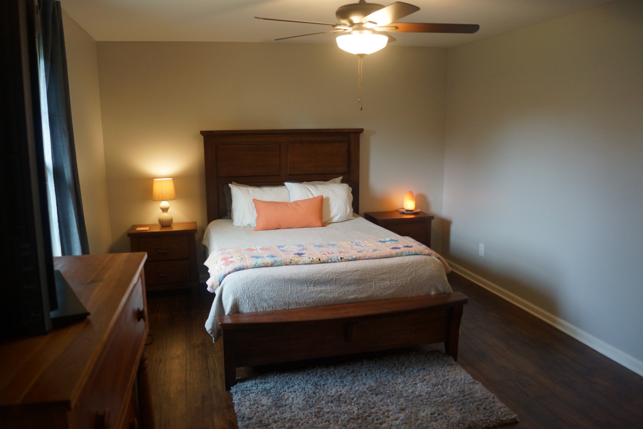 1744 Murfreesboro Road Lebanon, TN 37090 - Photo 14 of 29 a bed sitting in a bedroom next to a lamp