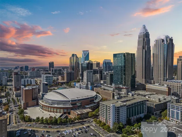 a view of a city with tall buildings