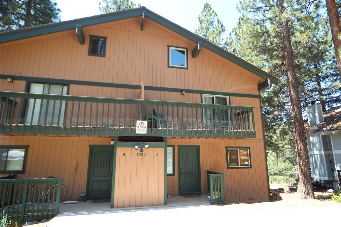1025 Tomahawk Trail Incline Village, NV 89451 - Photo 1 of 8 a front view of a house with a balcony