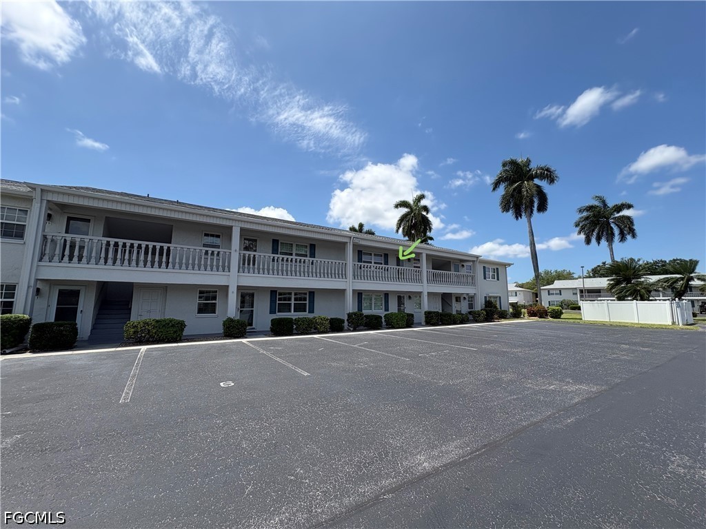 1830 Brantley Road, Unit I7 Fort Myers, FL 33907 - Photo 2 of 34 a view of a building with a street