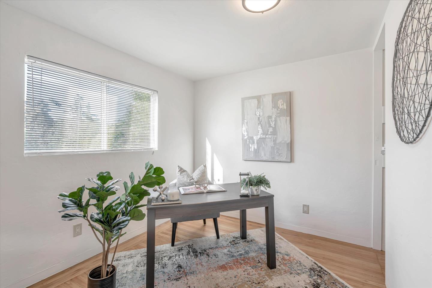 1041 Hargus Avenue Vallejo, CA 94591 - Photo 18 of 35 a workspace with furniture and a potted plant