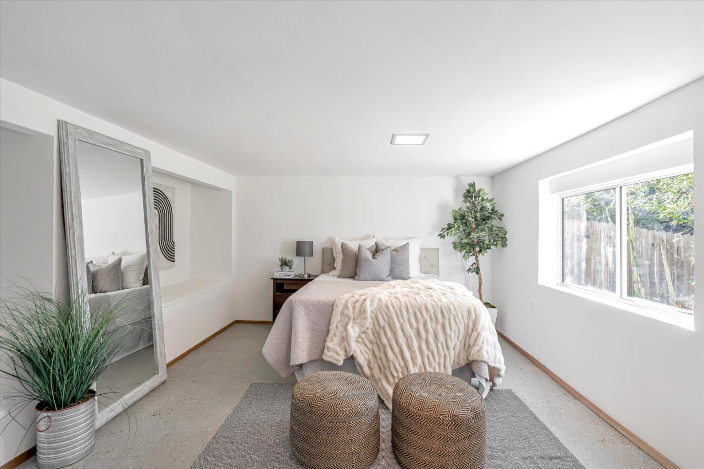 1041 Hargus Avenue Vallejo, CA 94591 - Photo 26 of 35 a bedroom with a large bed and windows