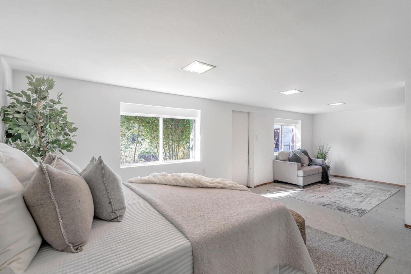 1041 Hargus Avenue Vallejo, CA 94591 - Photo 27 of 35 a bedroom with a bed and a couch