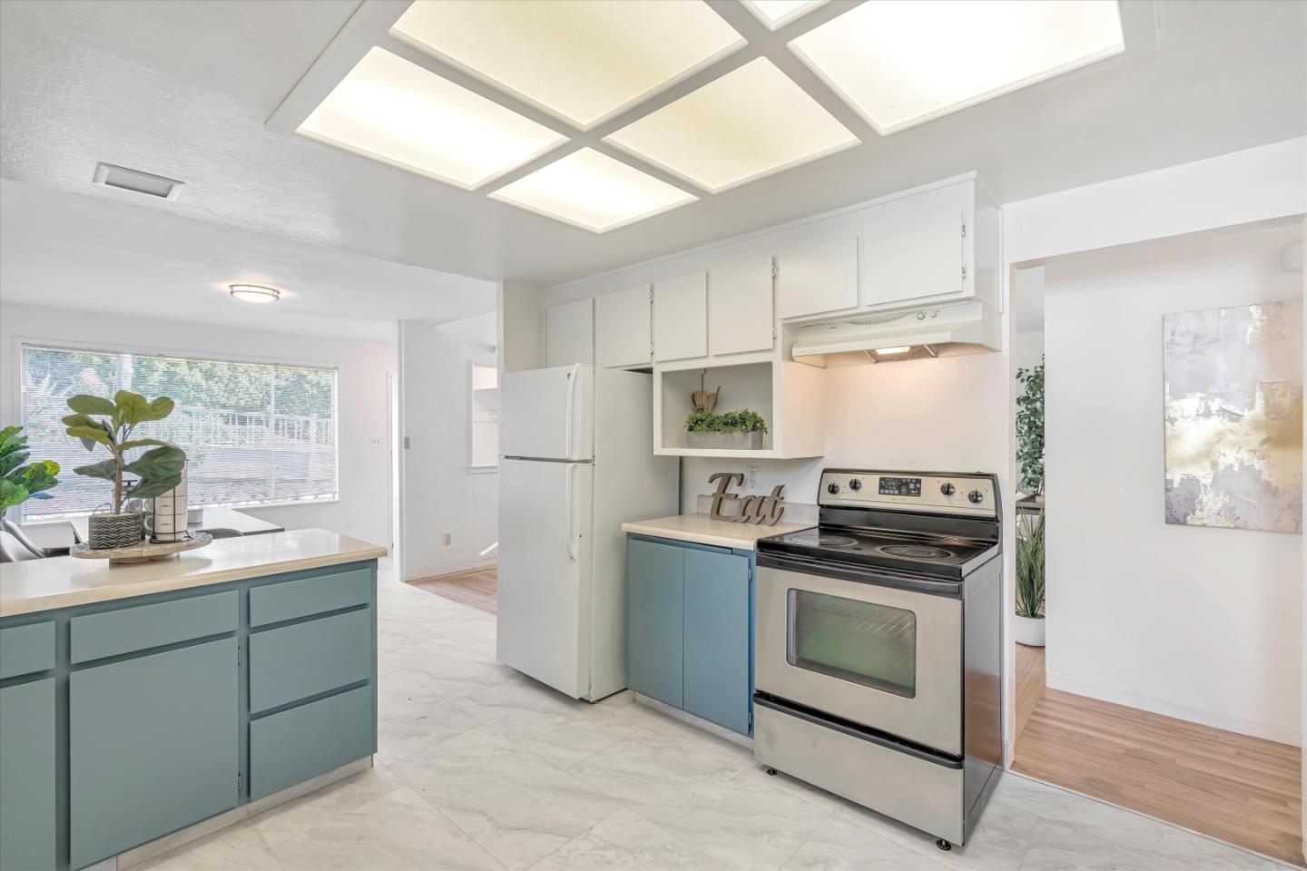 1041 Hargus Avenue Vallejo, CA 94591 - Photo 10 of 35 a kitchen with stainless steel appliances white cabinets and a sink