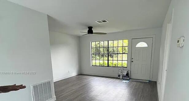 841 Northwest Riverside Drive Port St. Lucie, FL 34983 - Photo 4 of 17 Living/Dining room