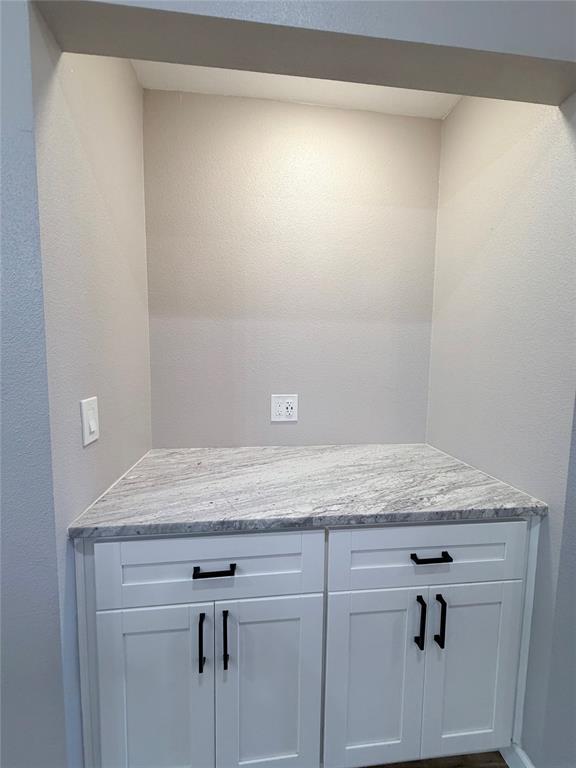 710 North Rusk Street Weatherford, TX 76086 - Photo 11 of 30 Built in desk with Granite tops. Could use as buffet area, or bar