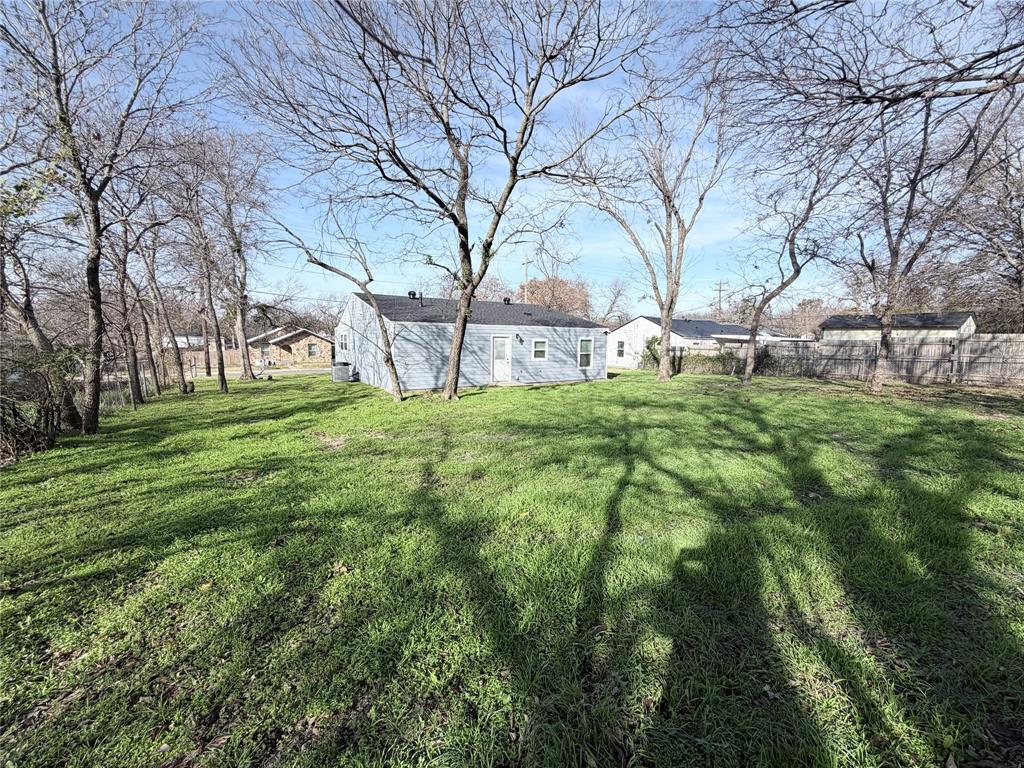 710 North Rusk Street Weatherford, TX 76086 - Photo 2 of 30 Large open backyard. Clean slate, perfect to design your dream yard!