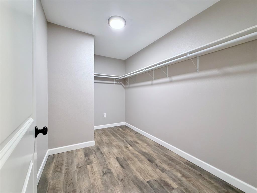 710 North Rusk Street Weatherford, TX 76086 - Photo 24 of 30 Primary bedroom closet