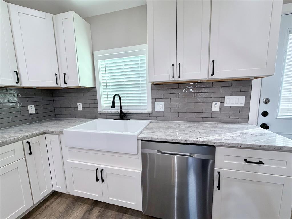 710 North Rusk Street Weatherford, TX 76086 - Photo 5 of 30 farm house sink, stainless appliances