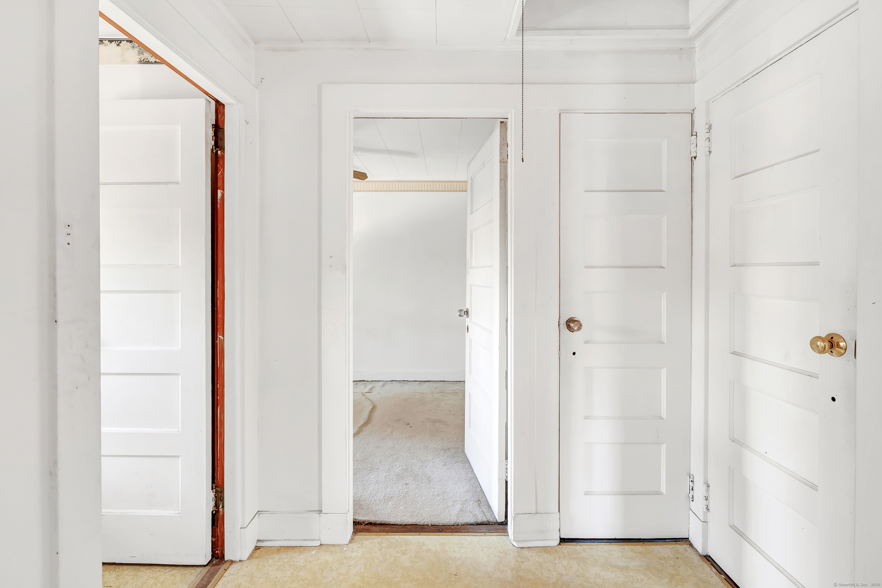 22 Sims Street Bridgeport, CT 06604 - Photo 5 of 22 a view of a bathroom from a hallway