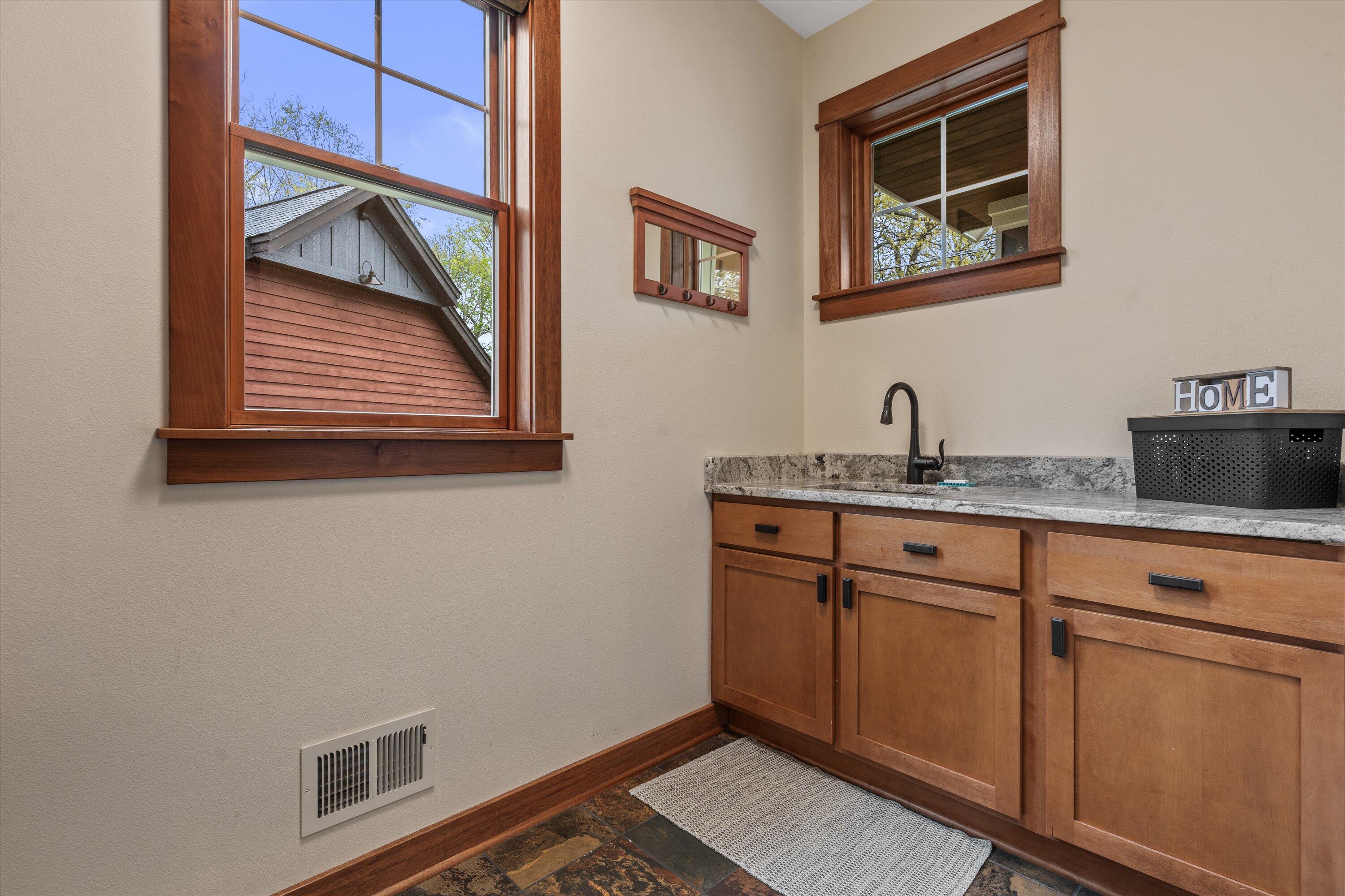 N53-w34257 Rd Q Okauchee, WI 53069 - Photo 13 of 35 13 Laundry Room with Sink