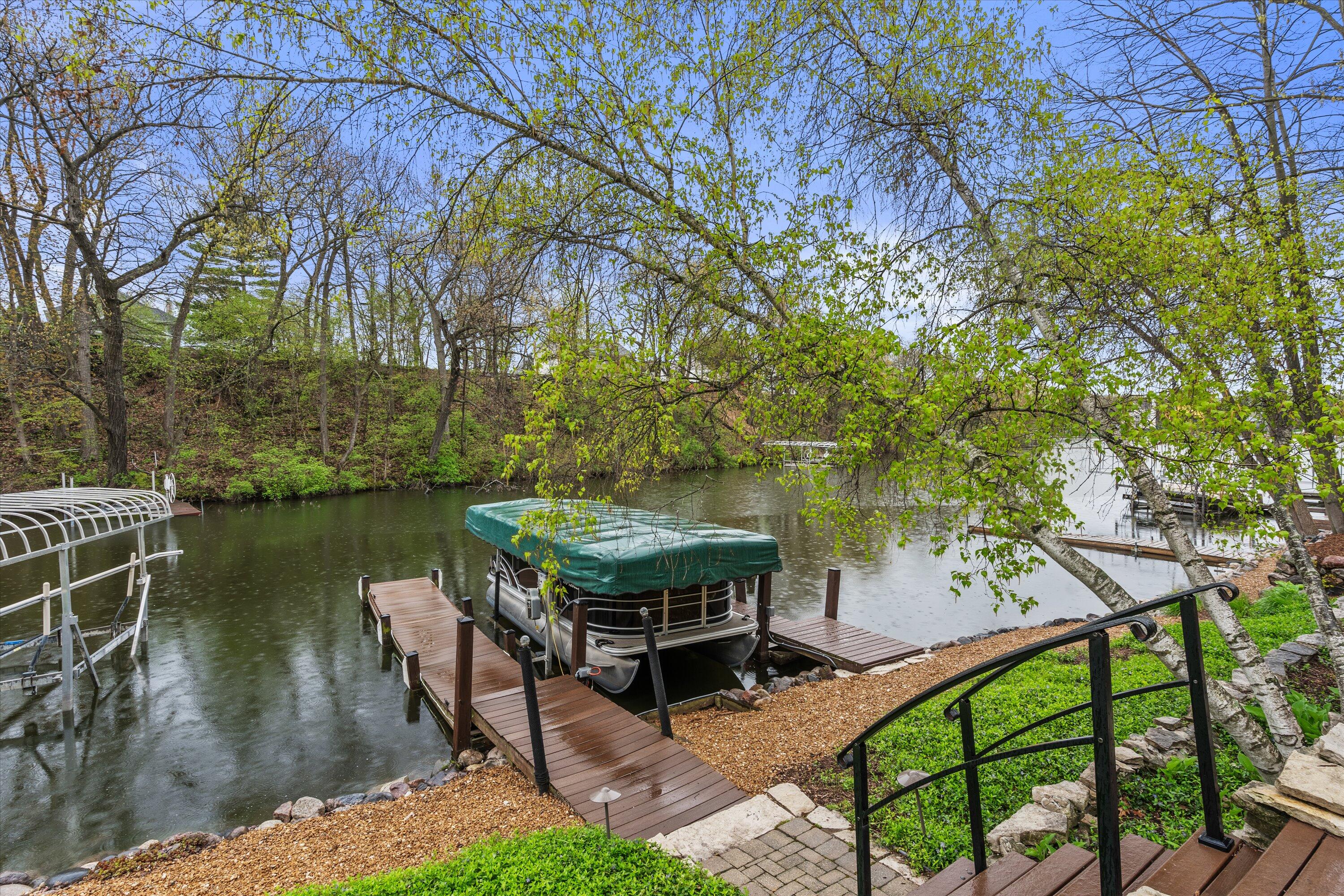 N53-w34257 Rd Q Okauchee, WI 53069 - Photo 31 of 35 31 Two Piers & Boat Lift Included