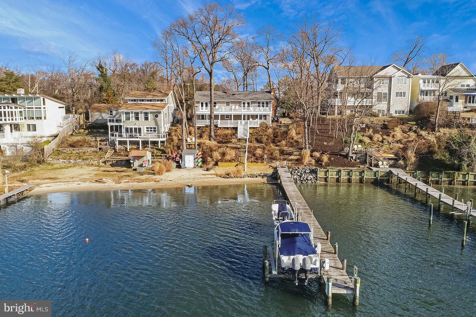 265 Long Point Road Crownsville, MD 21032 - Photo 32 of 37 Aerial view of the home, beach, and private pier
