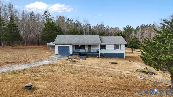 a house with trees in the background