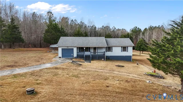 a house with trees in the background