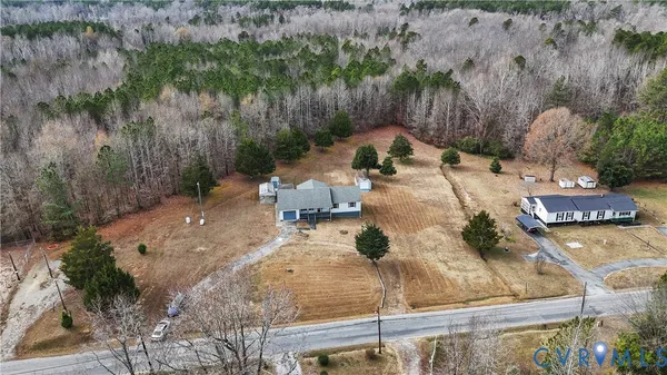 a view of a backyard of the house