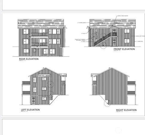 a black and white photo of a living room