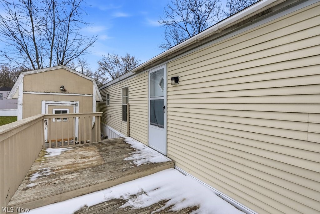 6507 Robby Lane Ravenna, OH 44266 - Photo 4 of 25 Deck with an outdoor structure