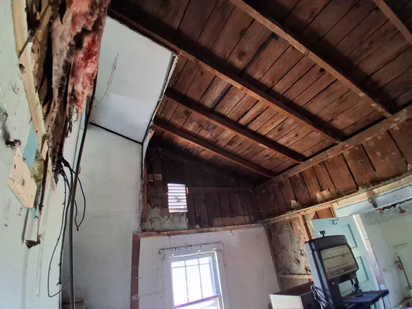 a room with furniture and a chandelier