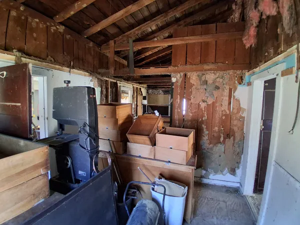 a view of staircase with wooden floor