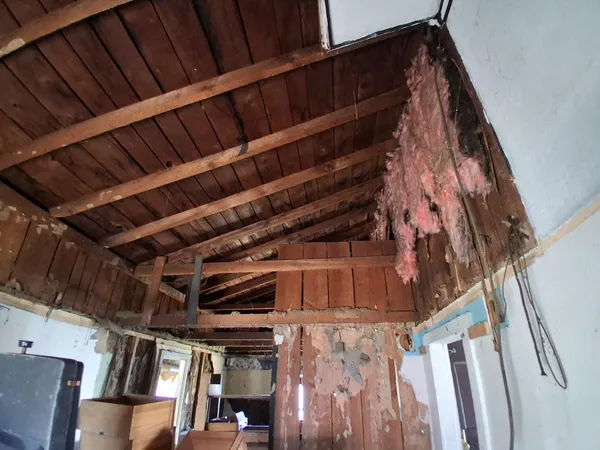 a view of staircase with railing and stairs