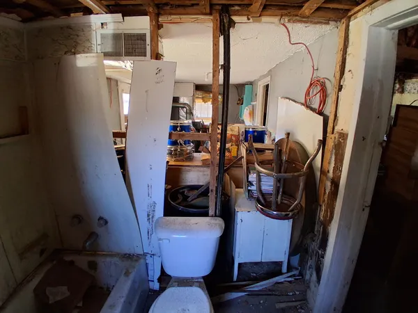 a view of livingroom with furniture and a window