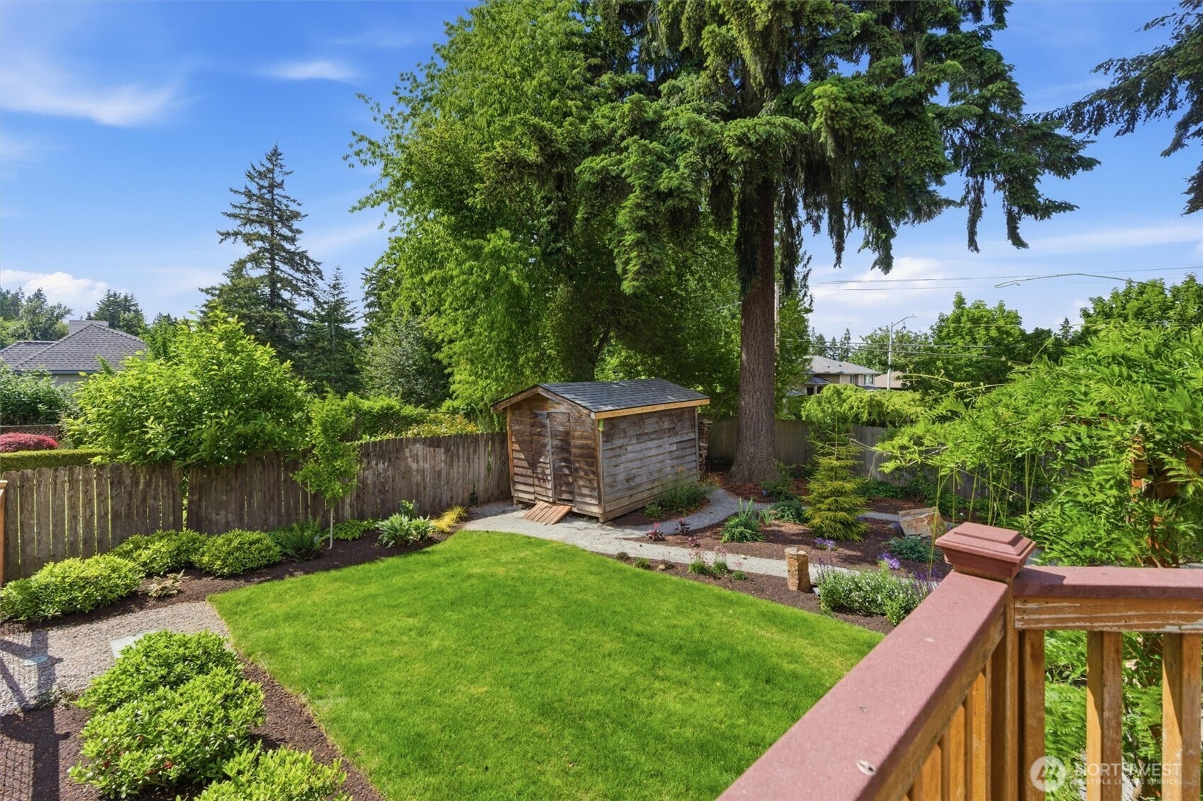 2101 233rd Street Southeast Bothell, WA 98021 - Photo 28 of 40 a garden view with a seating space