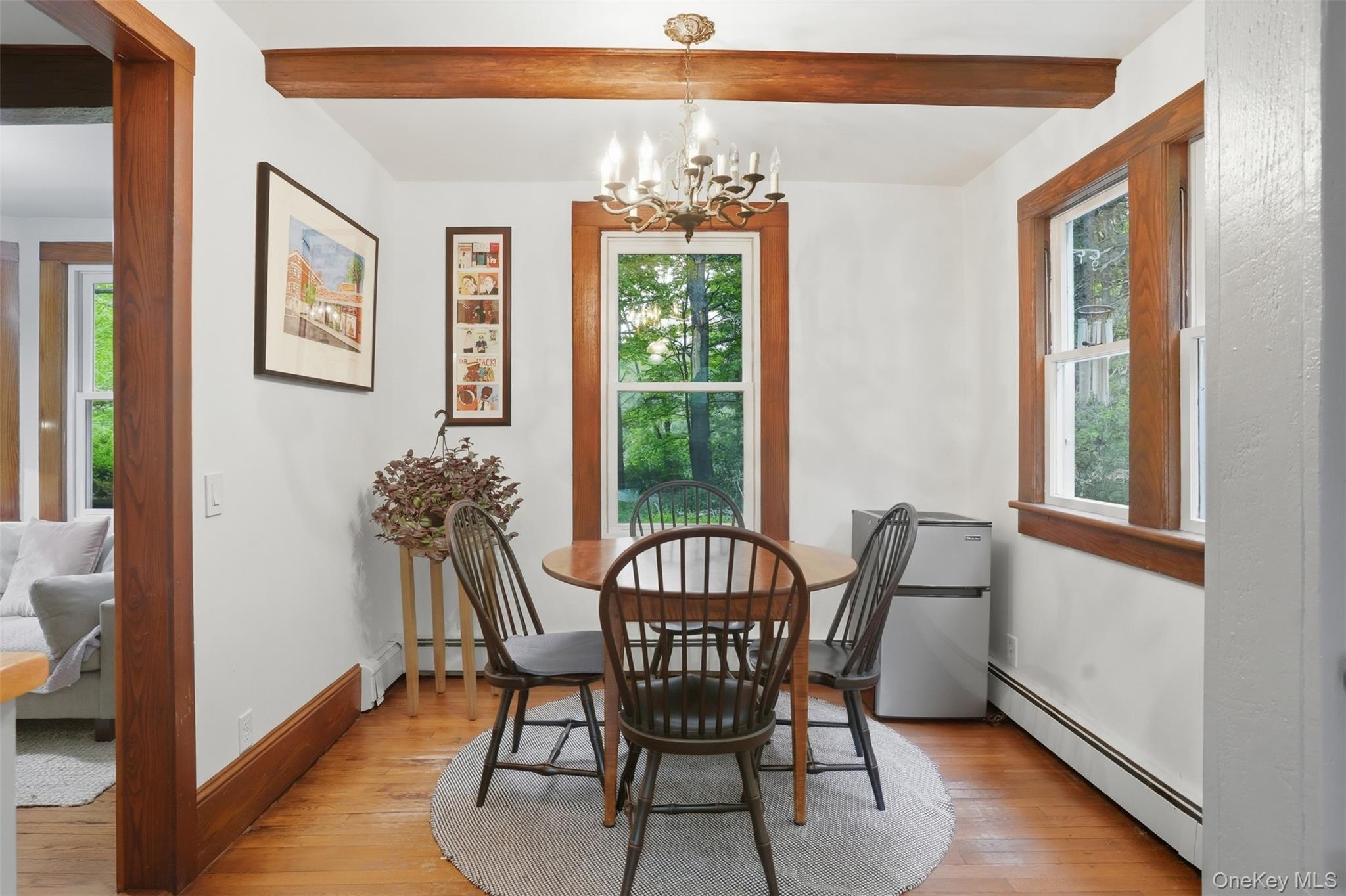 726 Wittenberg Road Mount Tremper, NY 12457 - Photo 14 of 32 a view of a dining room with furniture window and wooden floor