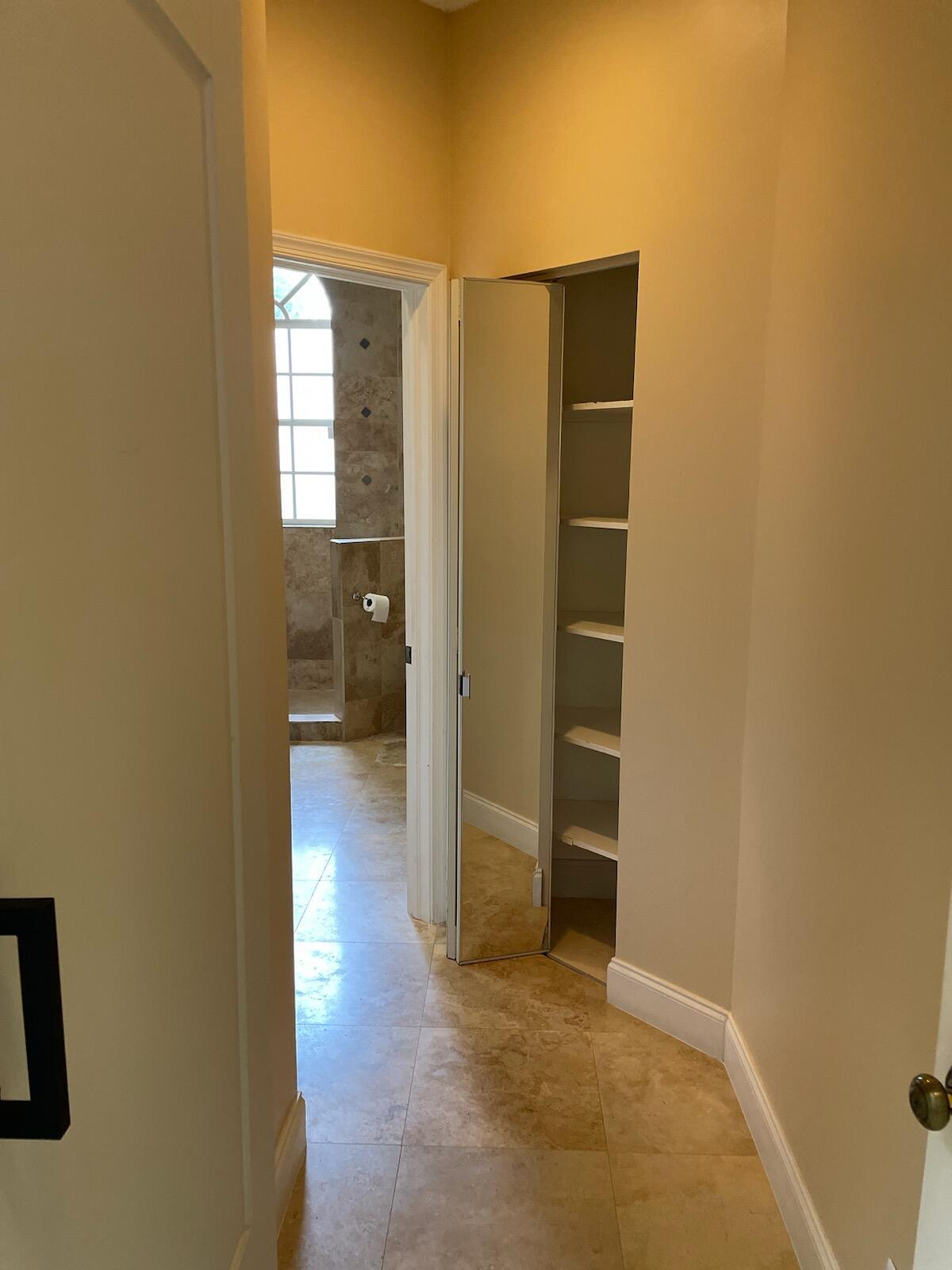 6675 Northwest 25th Way Boca Raton, FL 33496 - Photo 17 of 61 Master bedroom hallway