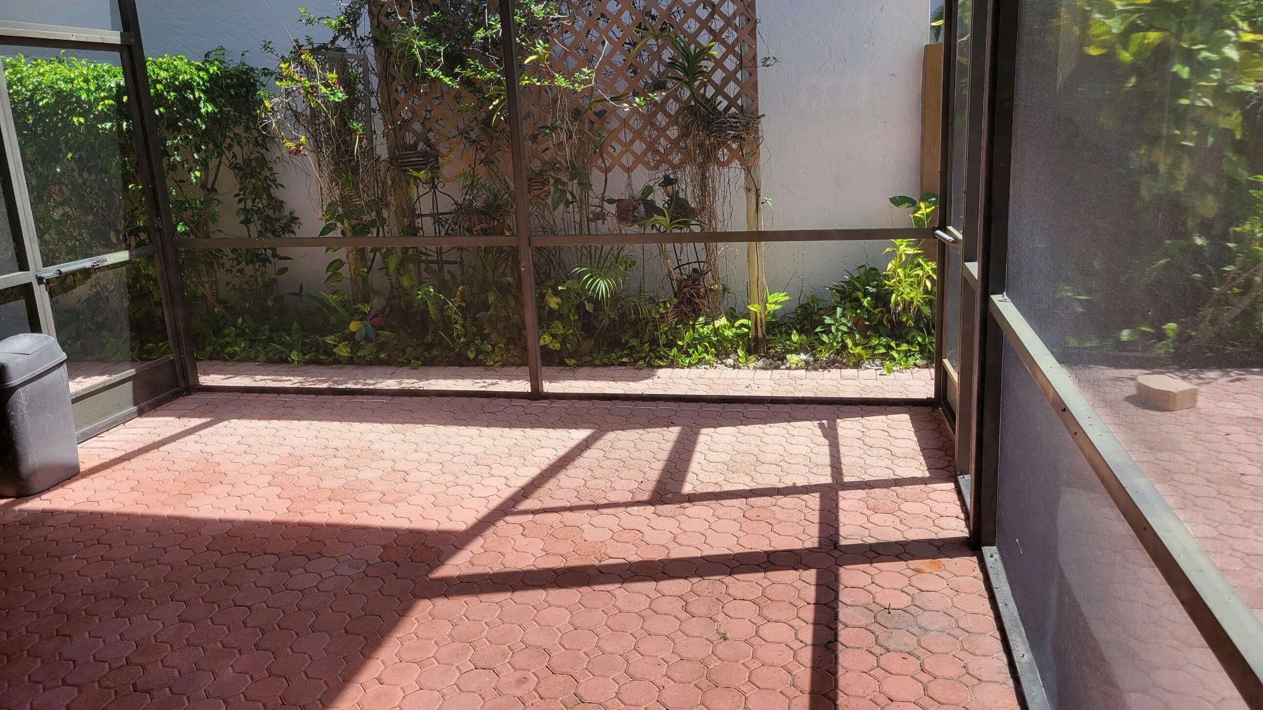 6675 Northwest 25th Way Boca Raton, FL 33496 - Photo 8 of 61 Screened in patio