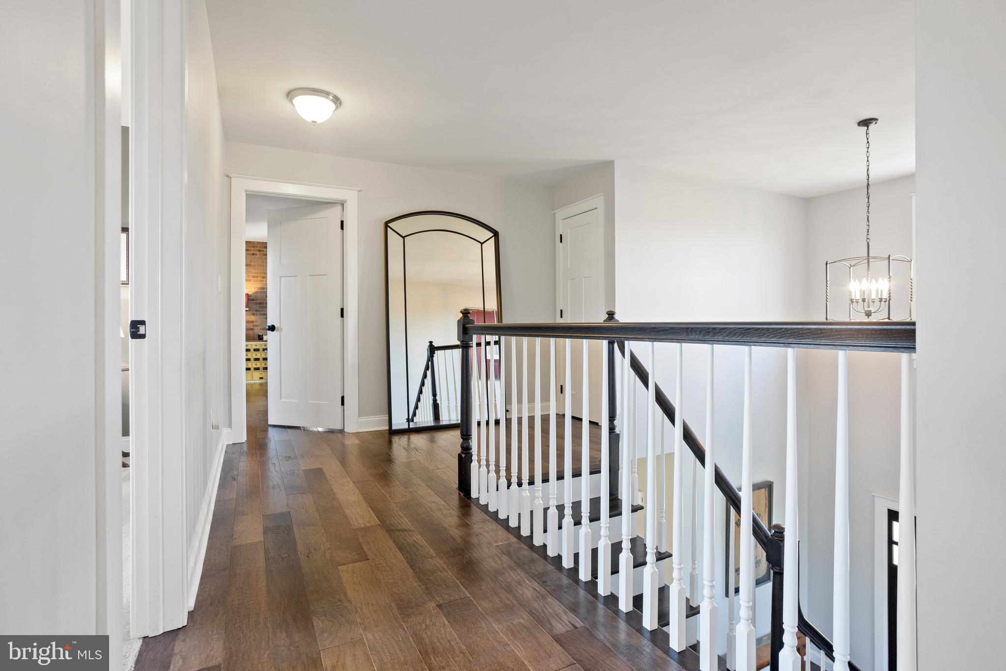 33 Docwill Drive Barto, PA 19504 - Photo 25 of 54 a view of a hallway with wooden floor and staircase