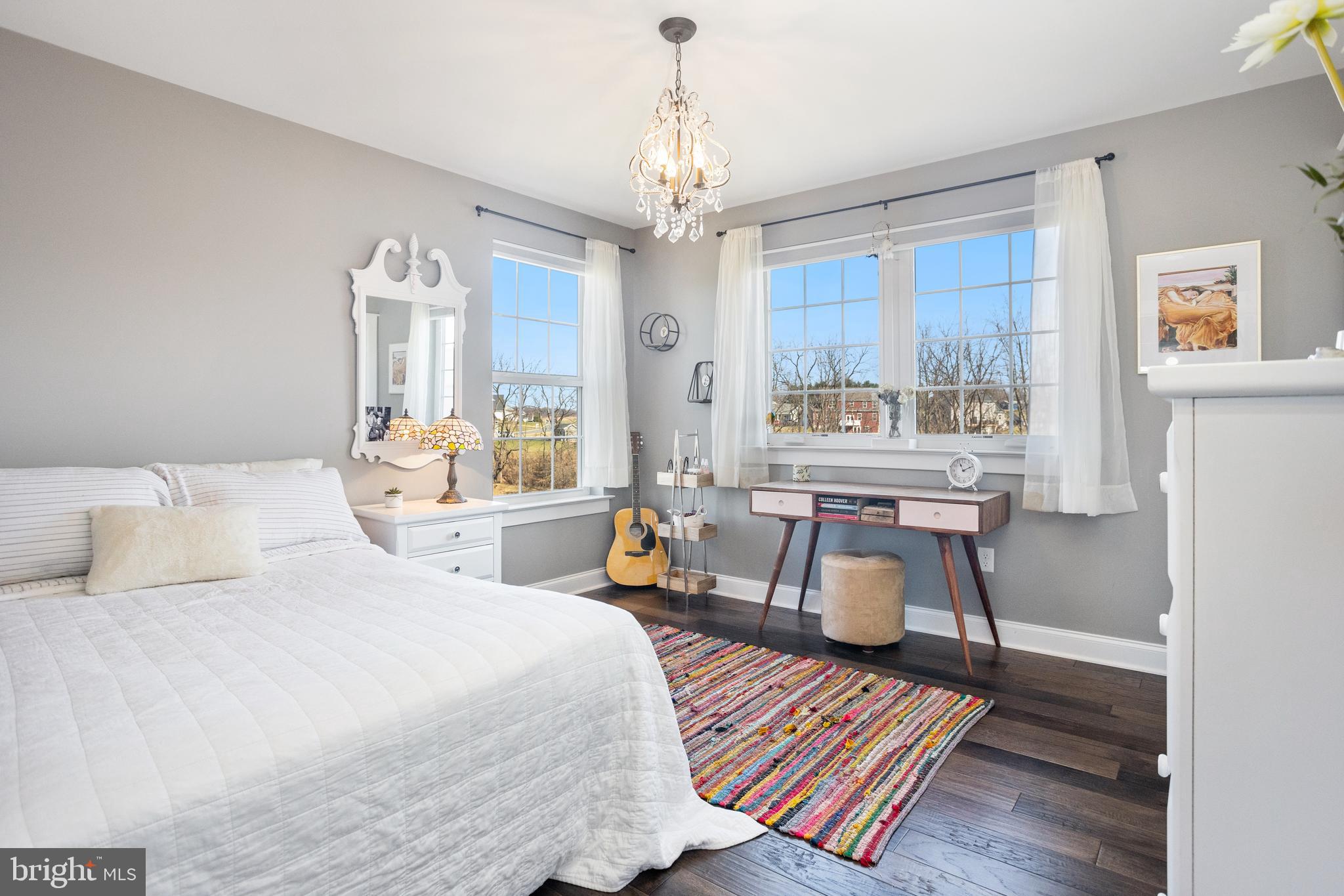 33 Docwill Drive Barto, PA 19504 - Photo 27 of 54 a bedroom with furniture and a chandelier