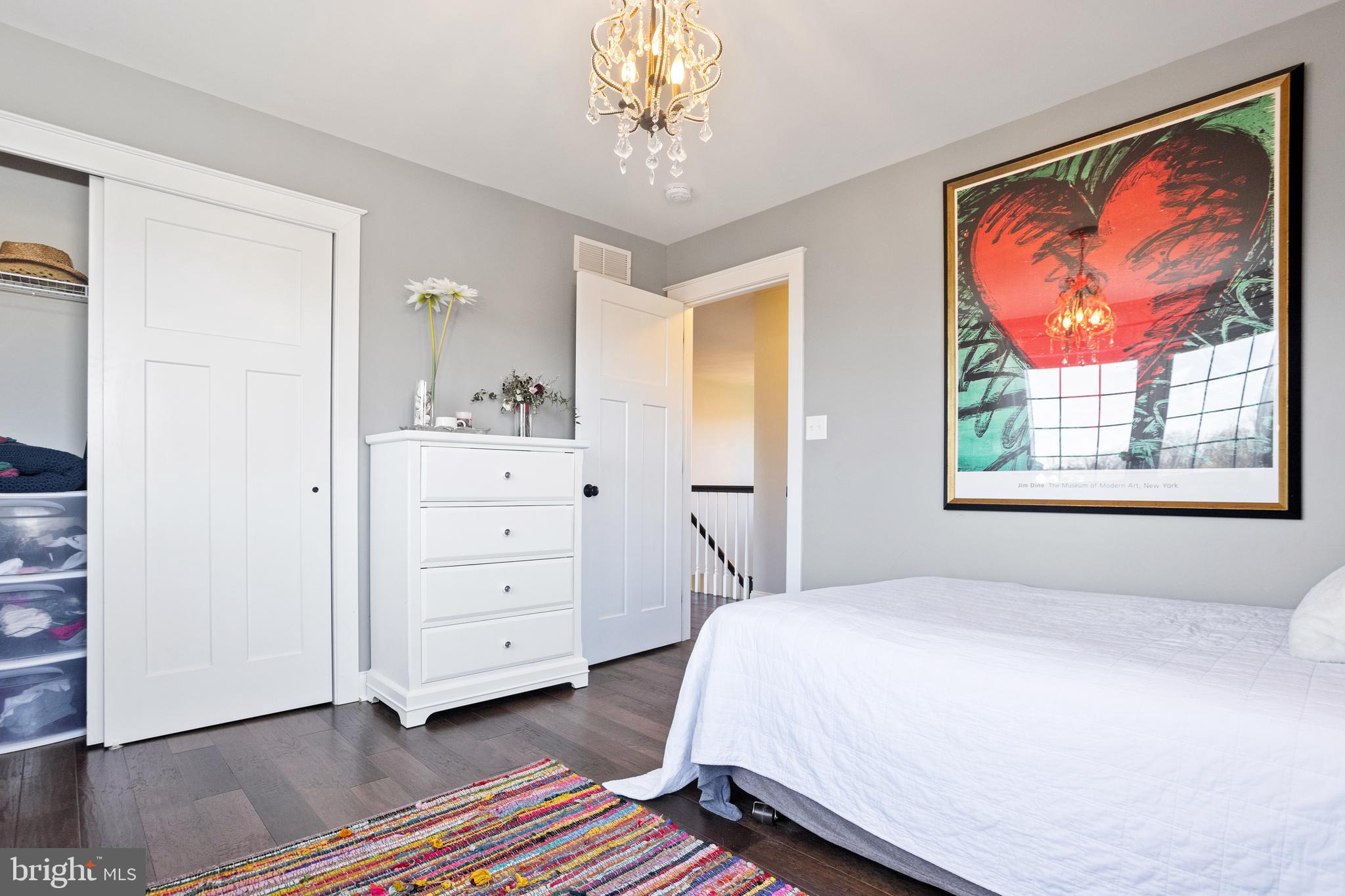 33 Docwill Drive Barto, PA 19504 - Photo 29 of 54 a bedroom with a bed and a painting on the wall