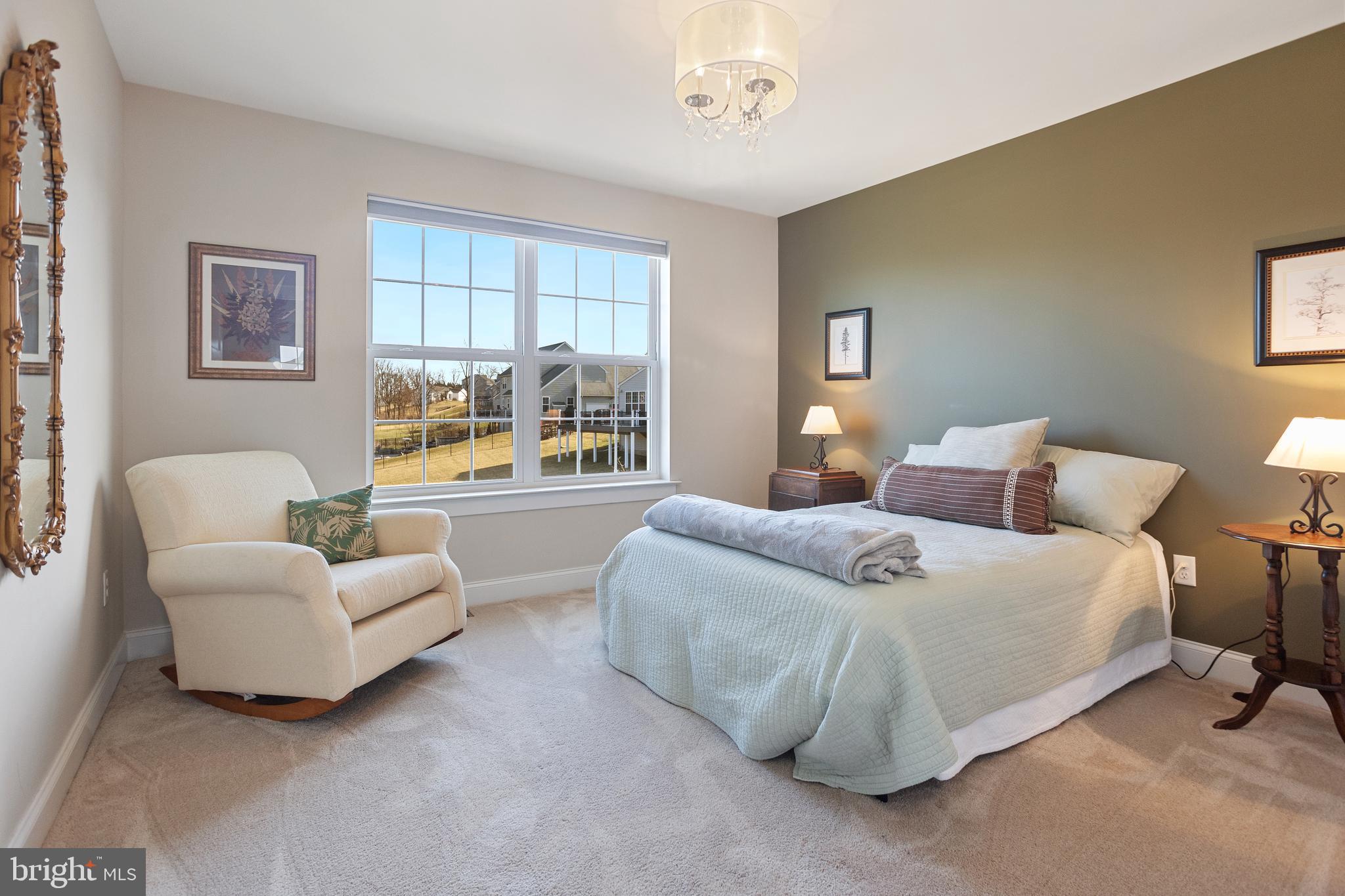 33 Docwill Drive Barto, PA 19504 - Photo 33 of 54 a bedroom with a bed and a couch