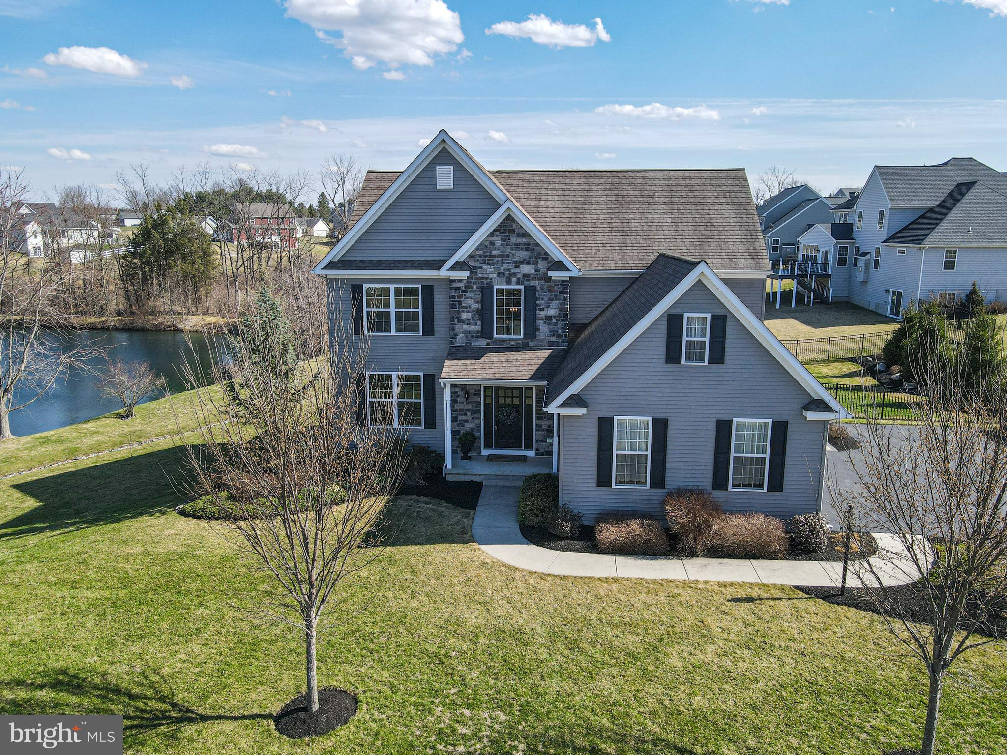 33 Docwill Drive Barto, PA 19504 - Photo 4 of 54 a front view of a house with a yard