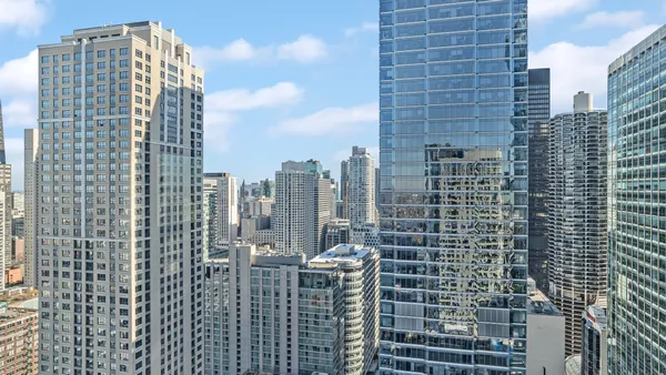 a view of a city with tall buildings