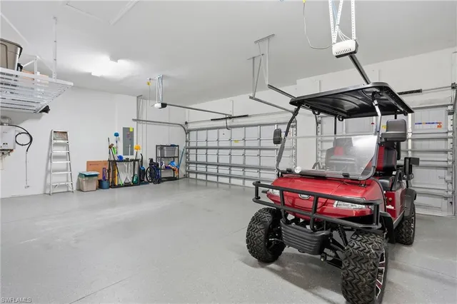 a bathroom with a toilet sink vanity and mirror