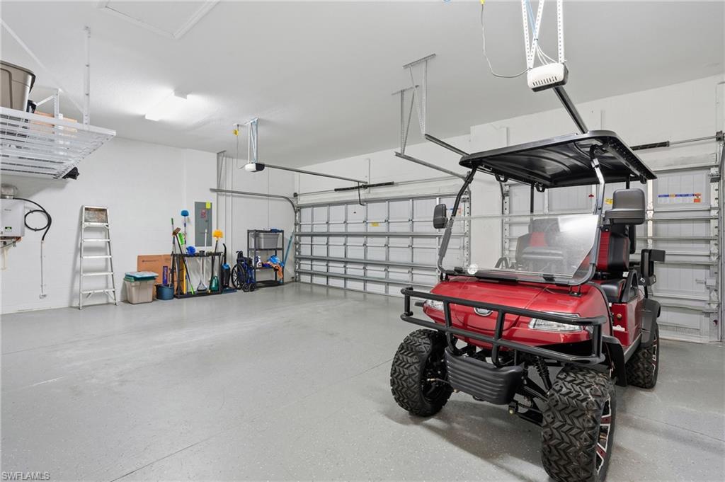 13686 Blue Bay Circle Fort Myers, FL 33913 - Photo 32 of 50 a view of a storage room with racks