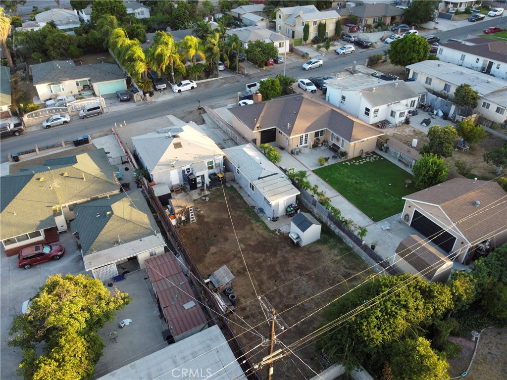 11661 Valverda Avenue Riverside, CA 92505 - Photo 14 of 39 an aerial view of multiple houses with yard