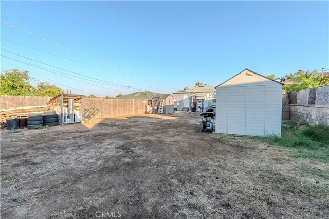 a view of backyard of house