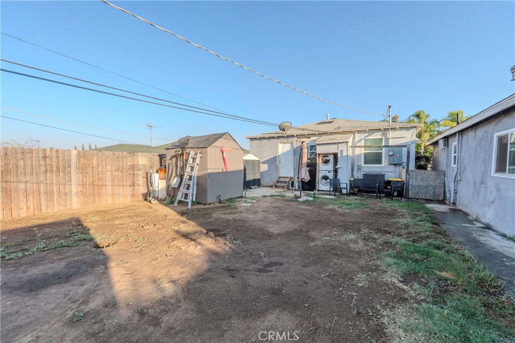 11661 Valverda Avenue Riverside, CA 92505 - Photo 19 of 39 a view of a house with a backyard