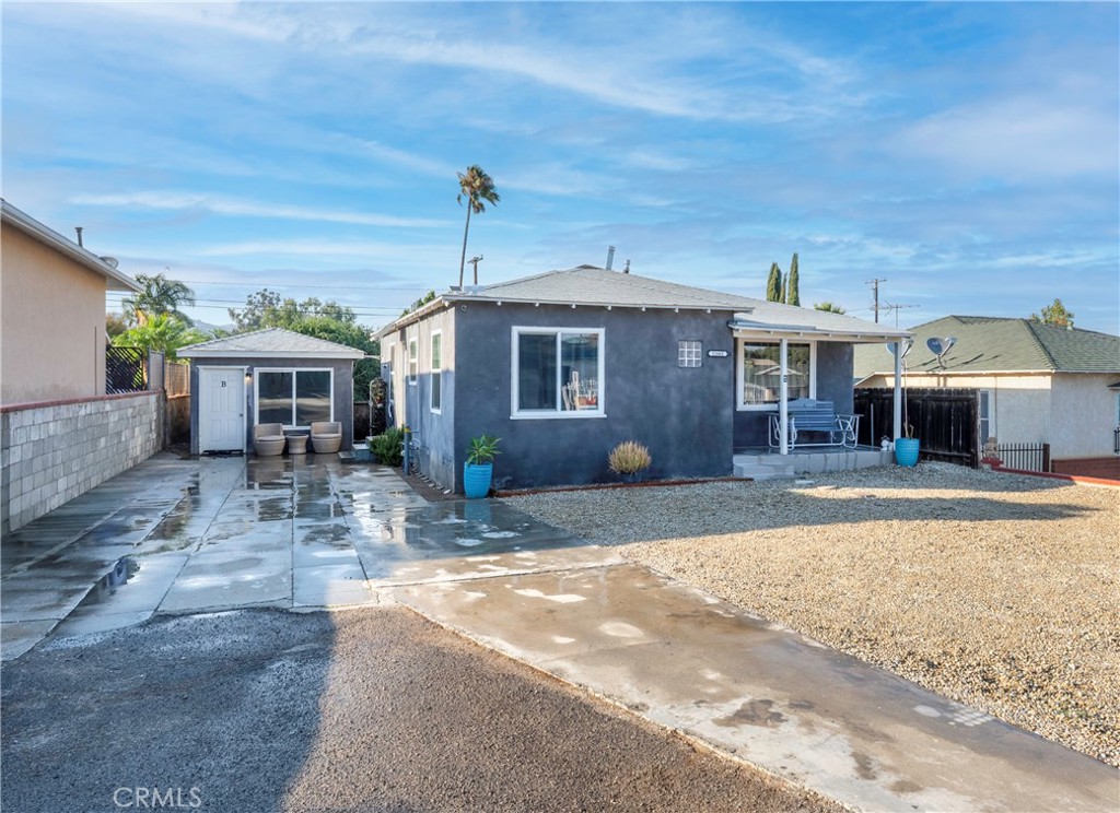 11661 Valverda Avenue Riverside, CA 92505 - Photo 39 of 39 a front view of a house with a yard