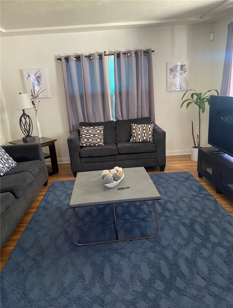 11661 Valverda Avenue Riverside, CA 92505 - Photo 4 of 39 a living room with furniture